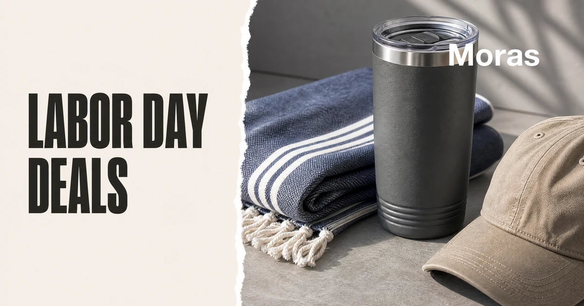 Full-bleed editorial Blog cover for TikTok Shop Labor Day Deals 2026: Affiliate Playbook, with the bold headline LABOR DAY DEALS inside a continuous pale warm-ivory panel on the left, a restrained torn-paper divider, and an unbranded tumbler, folded textile, and cap arranged in the independent cool-neutral right-side area. The cover includes one Moras wordmark in the upper-right corner and no unrelated text or logos.